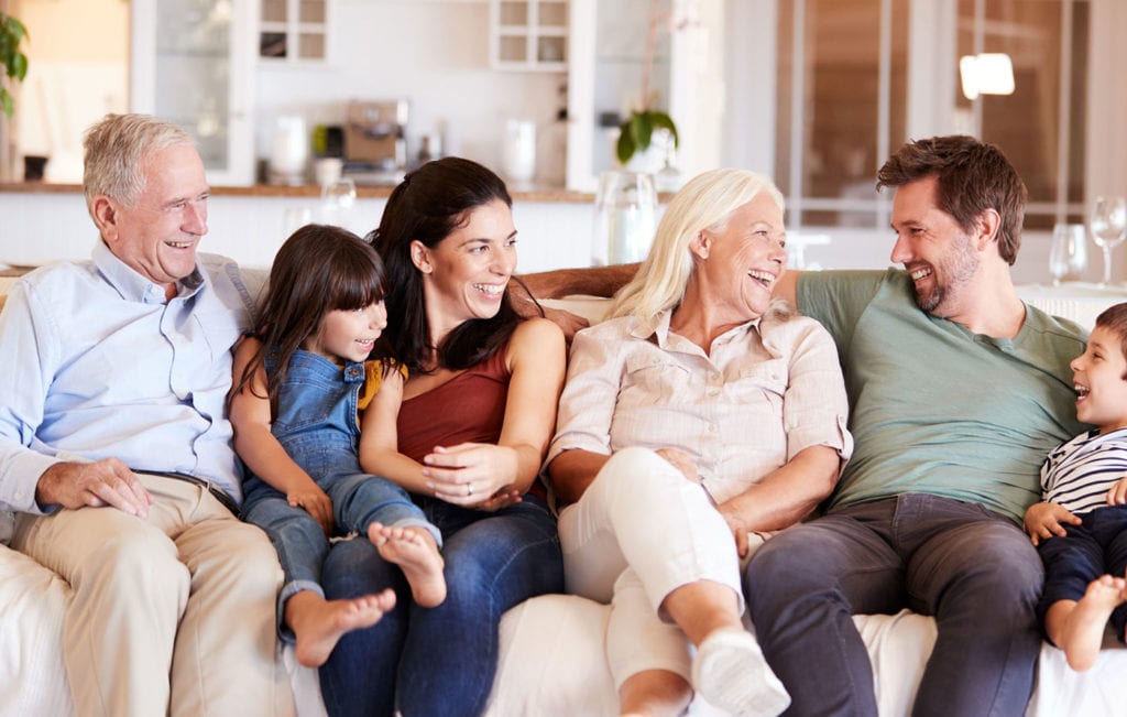 Retirement-planning-customers-happy-sitting-on-a-couch