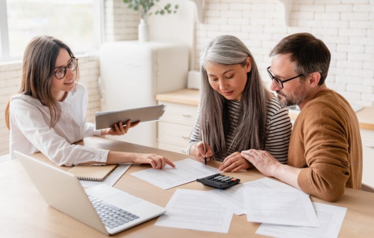A couple working with a financial planner.