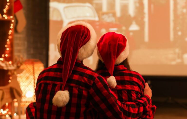 A couple watching a Christmas film